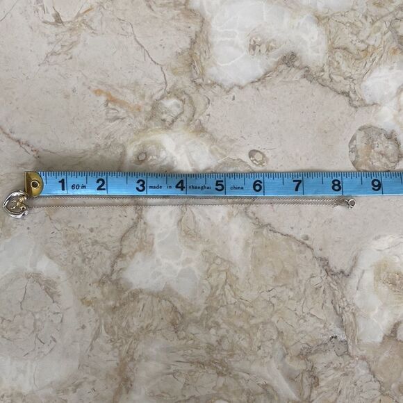 Tiffany & Co. 18K Gold & Sterling Silver Heart & Bow Ribbon Necklace - Picture 8 of 10